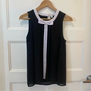 Twik sleeveless black and white blouse with bow